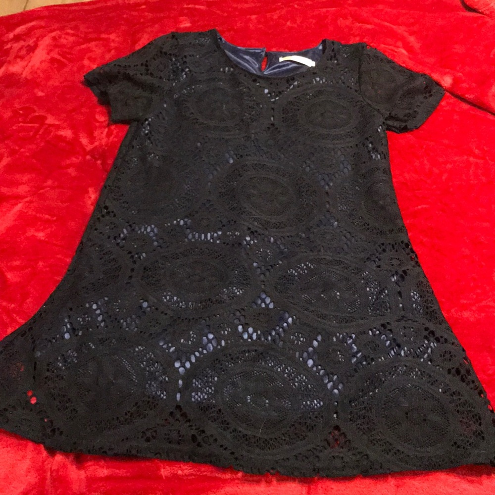 Black crocheted dress with blue lining